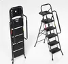 Two views of a black folding step stool on a white background. Anteprima dell’immagine prodotto