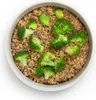 A bowl of quinoa with broccoli florets. Anteprima dell’immagine prodotto