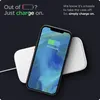 A smartphone is placed on a wireless charger. Anteprima dell’immagine prodotto