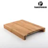 A bamboo cutting board with a stainless steel drip tray, presented on a white background with a brand logo and name in the upper right corner. Náhľad obrázku produktu