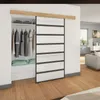 A modern closet with clothes hanging and a sliding door with glass panels. Produktbild-Vorschau