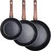 Three frying pans of different sizes are arranged diagonally on a white background. Náhled obrázku produktu