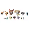 A collection of small, stylized toy animal figures arranged in two rows against a white background. Podgląd zdjęcia produktu