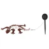 A solar-powered garden decoration in the shape of a gecko. Produktbild-Vorschau