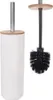 A toilet brush set with a white holder and a black brush. Anteprima dell’immagine prodotto