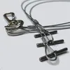 Close-up of metal wire ropes with metal fasteners and a carabiner clip. Anteprima dell’immagine prodotto
