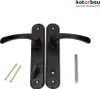A pair of black door handles with mounting hardware on a white background. Produktbild-Vorschau