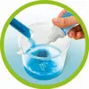 A hand is adding blue glitter to a beaker of blue liquid, with a test tube also pouring blue glitter into the beaker. Anteprima dell’immagine prodotto