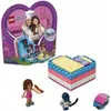 A LEGO Friends Olivia's Summer Heart Box playset is displayed with its packaging and accessories. Anteprima dell’immagine prodotto