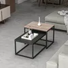 A modern living room setting with nesting coffee tables. Anteprima dell’immagine prodotto