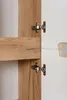 Close-up view of cabinet hinges and wooden structure. Náhľad obrázku produktu