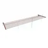 A brown aluminum clothes drying rack is mounted on a white wall. Voir les images du produit