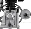 A close-up view of an air compressor pump, highlighting the oil viewing window. Náhľad obrázku produktu