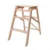 A wooden step stool with three steps is shown against a white background. Podgląd zdjęcia produktu