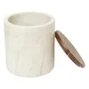 A beige marble container with a brown wooden lid is shown against a white background. Anteprima dell’immagine prodotto