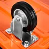 A close-up view of a caster wheel attached to an orange surface. Podgląd zdjęcia produktu
