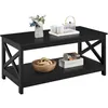 A black coffee table with a lower shelf, decorated with a vase of flowers, teacups, a teapot, a wooden bowl with decorative items, and books. Produktbild-Vorschau