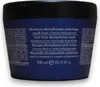 A dark blue jar of hair mask with text on the front. Náhled obrázku produktu