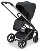 A black and gray stroller is shown against a white background. Produktbild-Vorschau