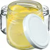Three glass jars, one filled with lemon slices and liquid, with a white lid resting on the side. Podgląd zdjęcia produktu