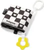 A black and white baby toy book with a yellow flower-shaped teether attached. Produktbild-Vorschau