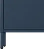 A close-up view of the bottom corner of a dark blue metal cabinet, showing its legs and textured surface. Voir les images du produit