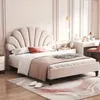 A bedroom scene with a bed, vanity, and rug. Produktbild-Vorschau