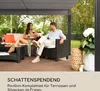 A couple enjoying drinks under a gazebo in a garden setting. Produktbild-Vorschau
