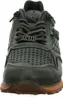 Front view of a green sneaker. Voir les images du produit