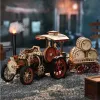 A wooden model steam engine with a trailer of barrels, set in a dimly lit, outdoor scene. Produktbild-Vorschau