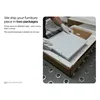 Hands in gloves packing a white furniture piece into a cardboard box with protective foam. Anteprima dell’immagine prodotto