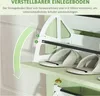 Close-up of a shoe rack shelf with adjustable shelf height indicated by numbered markers. Voir les images du produit