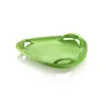 A green plastic sled on a white background. Anteprima dell’immagine prodotto