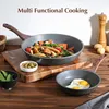 A still life arrangement of cookware and food on a wooden surface, with text overlay. Produktbild-Vorschau