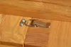 A close-up of a metal latch on a wooden surface. Produktbild-Vorschau