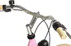 Close-up view of the handlebars and front of a pink bicycle. Produktbild-Vorschau