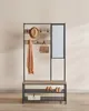A multi-functional hall tree with a mirror, bench, and storage shelves. Produktbild-Vorschau