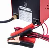 Close-up of the back panel of a red diagnostic tool, showing a technical data label, a smoke output connector, and power input with alligator clips. Náhľad obrázku produktu