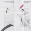 A close-up view of a transparent white curtain with a purple floral pattern, layered over text. Produktbild-Vorschau