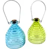 Two glass wasp traps, one blue and one yellow-green, are shown against a white background. Produktbild-Vorschau