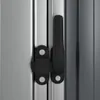 A close-up view of a black latch mechanism on a silver metal surface, likely part of a shed or storage unit. Produktbild-Vorschau