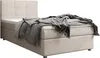 A single bed with a beige upholstered headboard and base, covered with a gray blanket. Voir les images du produit