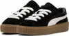 A pair of black Puma Creeper Phatty sneakers with white laces and a gum sole. Anteprima dell’immagine prodotto