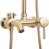 A close-up studio shot of a gold-brushed shower faucet set against a white background. Náhľad obrázku produktu