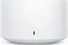 A white, cylindrical portable speaker with a small black indicator light on the front. Podgląd zdjęcia produktu