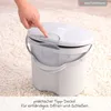 A hand is shown pressing the lid of a diaper pail. Produktbild-Vorschau