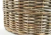 A close-up view of a woven rattan basket. Náhled obrázku produktu