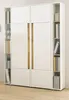 A white wardrobe with wood accents and shelves filled with books and decorative items. Produktbild-Vorschau