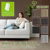 A woman relaxing on a white sofa in front of a wall with wood paneling. Several color samples of the wood panels are displayed on the right side of the image. Produktbild-Vorschau