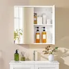 A bathroom cabinet with mirrored doors, displaying various toiletries and decorative items. Produktbild-Vorschau